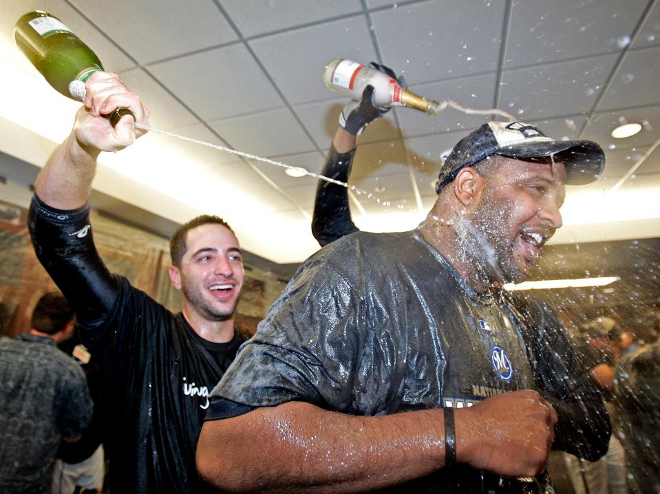 Milwaukee Brewers' Ryan Braun showers CC Sabathia with champagne after clinching the wild card by beating the Chicago Cubs at Miller Park on Sept. 28, 2008.