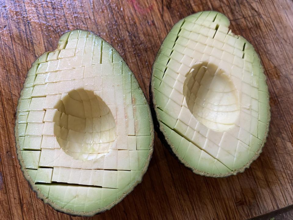 Slicing the avocado inside its skin made it simple to scoop out and add to the salad. (Photo: Megan duBois)