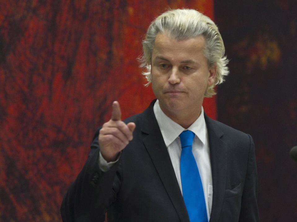 FILE - In this April 24, 2012 file photo Freedom Party lawmaker Geert Wilders addresses parliament in The Hague, Netherlands. With his mane of platinum-blond hair, Geert Wilders rose to prominence by hammering away at a hardcore anti-Islam message. Now, as the Netherlands heads into elections with economic crisis raging across the continent, Wilders has taken aim at a different target: the European Union. But this time, the populist firebrand's attempt to ride a wave of voter anger appears to be foundering. Wilders has tried to revive his Freedom Party's fortunes on promises to ditch the euro and ignore European budgetary rules ahead of the Sept. 12 election. (AP Photo/Peter Dejong, File)
