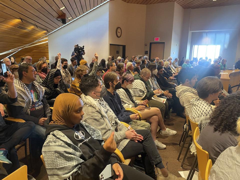 Pro-Palestinian supporters attended a University of Minnesota's Board of Regents meeting on Friday, May 10, 2024, in Minneapolis to demand divestment from companies that profit off the Israel-Hamas war. The University of Minnesota disclosed this week that about $5 million of its $2.27 billion endowment investments — or less than a quarter of 1% — are tied to Israeli companies or U.S. defense contractors. (AP Photo/Trisha Ahmed)