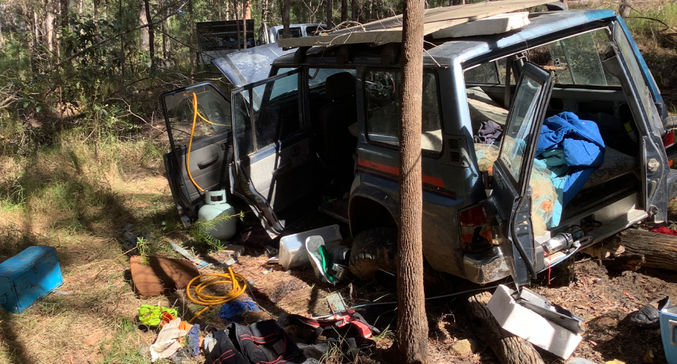 A 4WD found inside the Mapleton National Park with rubbish coming out of it.