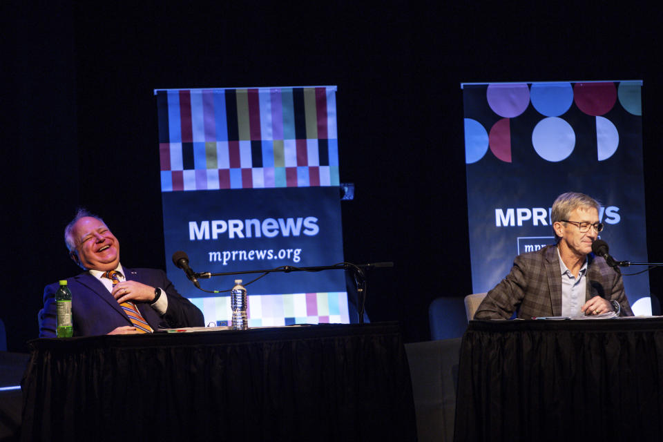 Incumbent Governor Tim Walz and gubernatorial candidate Scott Jensen engage in the third and final gubernatorial debate at the Fitzgerald Theater Friday, Oct. 28, 2022, in St. Paul. (AP Photo/Nicole Neri)