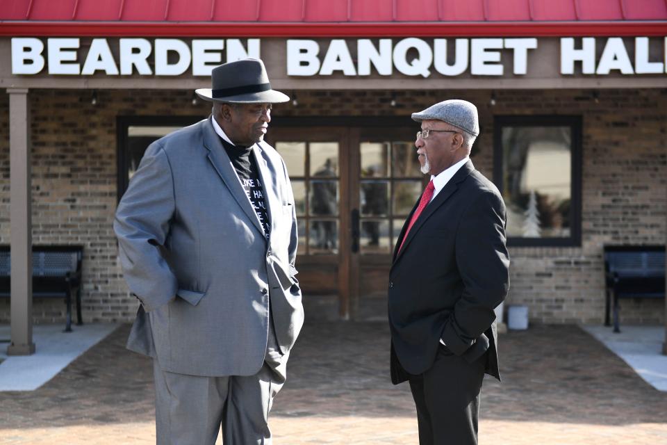 Rev. Harold Middlebrook (left) and Rev. Roger Mills Jr. chat outside the Bearden Banquet Hall, the site of the African-American Health, Education, Religion and News 13th annual DAPS Awards.