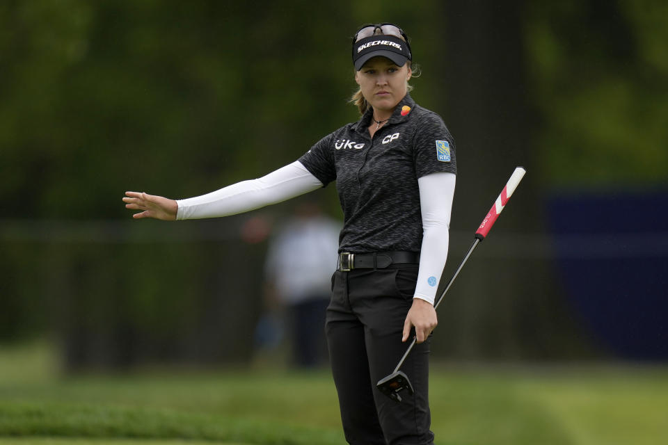 Brooke M. Henderson, of Canada, reacts to her putt on the 12th hole during the first round of the Women's PGA Championship golf tournament, Thursday, June 22, 2023, in Springfield, N.J. (AP Photo/Seth Wenig)