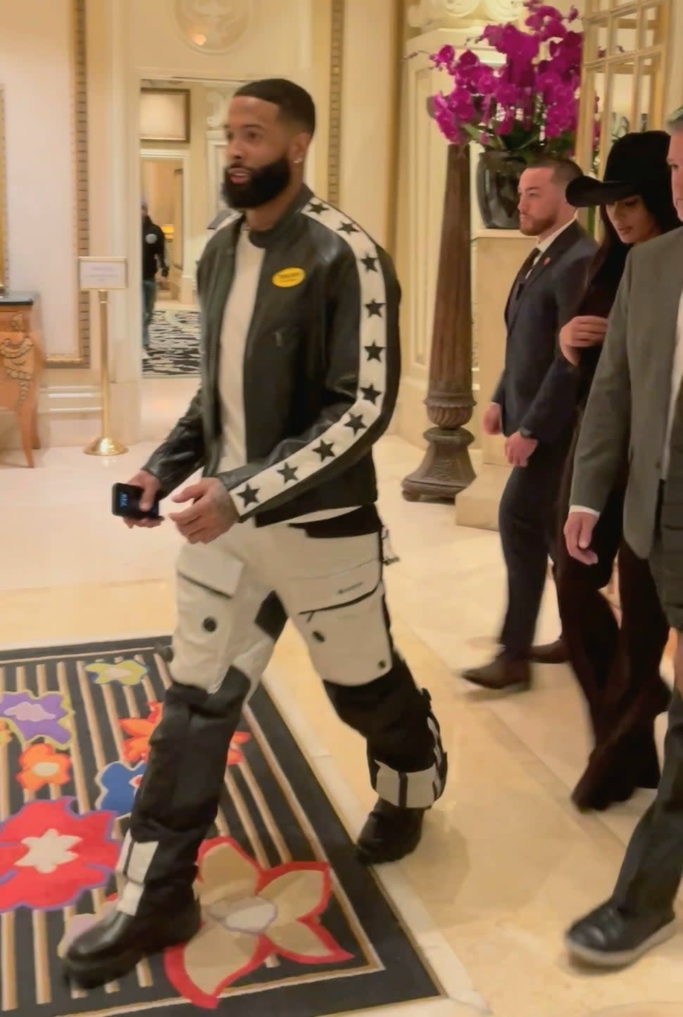 Kim Kardashian and Odell Beckham Jr. walking through a Las Vegas hotel.