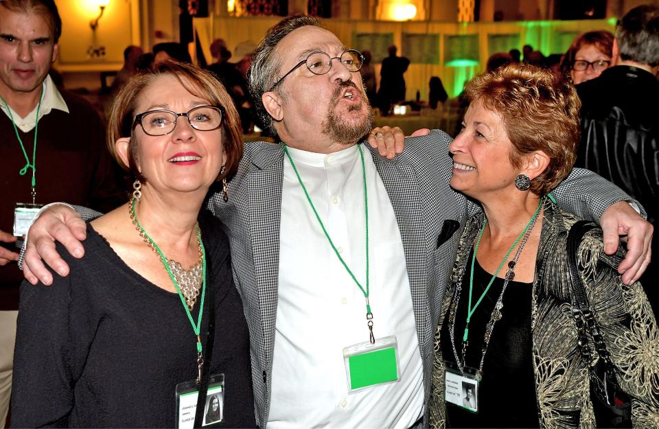 October 1, 2016: TV and Broadway star, Eddie Mekka, a member of the Burncoat High School Class of 1970, poses for a photo at Union Station with fellow classmates, Joanne Gale DiPinto, left, and Anne Lapierre Fratantonio, during the Burncoat High School "Mega 70's Reunion", bringing together all of the graduating classes from the 70's decade.