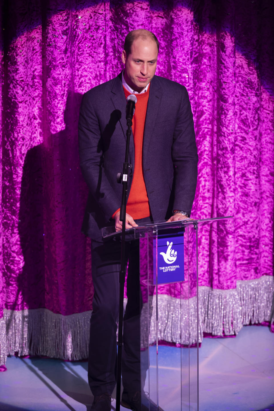 The Duke of Cambridge gives a speech on stage as he attends a special pantomime performance at London's Palladium Theatre, hosted by The National Lottery, to thank key workers and their families for their efforts throughout the pandemic.