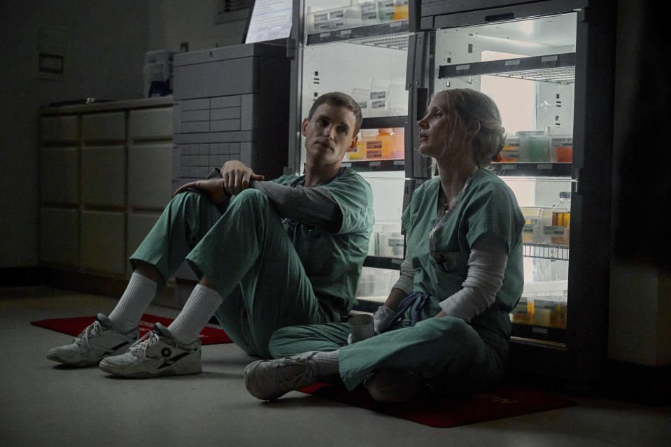 This image released by Netflix shows Eddie Redmayne and Jessica Chastain in a scene from "The Good Nurse." (JoJo Whilden/Netflix via AP)