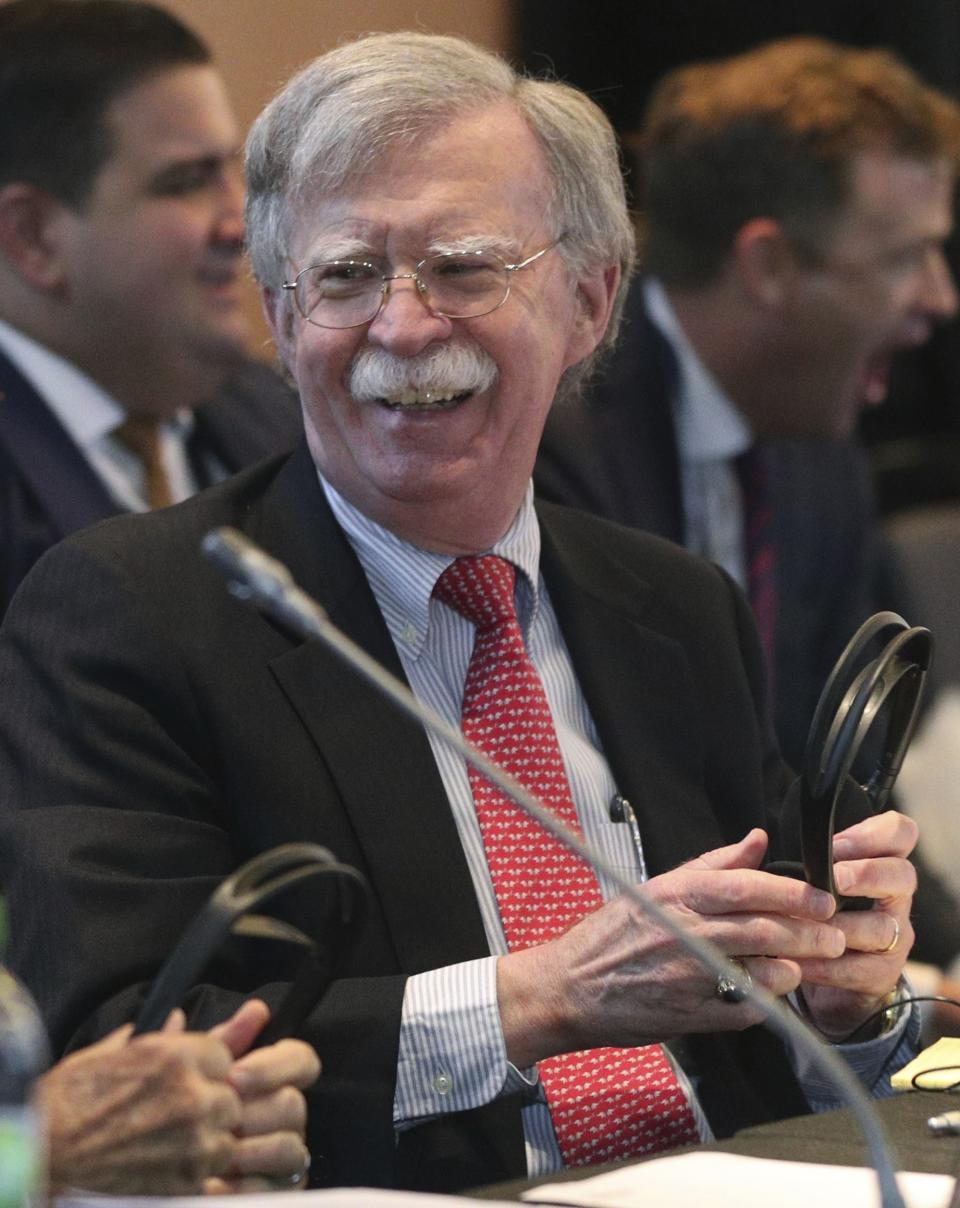 U.S. National security adviser John Bolton laughs during a conference of more than 50 nations that largely support Venezuelan opposition leader Juan Guaido in Lima, Peru, Tuesday, Aug. 6, 2019. Bolton said the U.S. will target anybody at home or abroad who supports the government of Venezuelan President Nicolas Maduro with stiff financial sanctions. Bolton spoke a day after the Trump administration announced a new round of sweeping measures aimed at pressuring Maduro from office. (AP Photo/Martin Mejia)