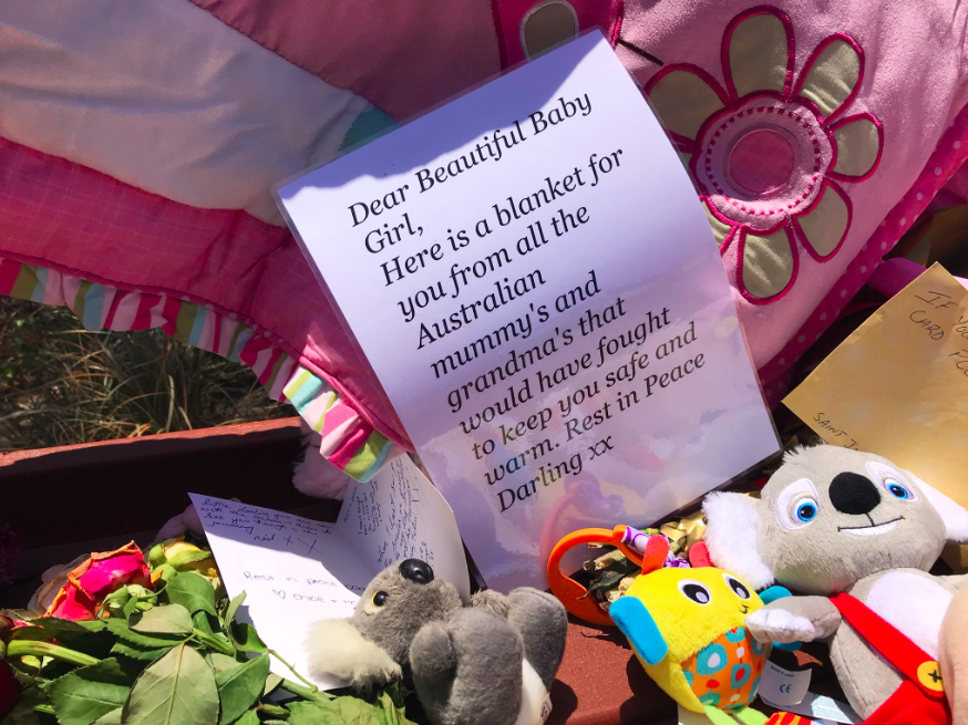 The message was left alongside dozens of tributes to the baby girl near Surfers Paradise beach. Source: 7News/ Sarah Greenhalgh