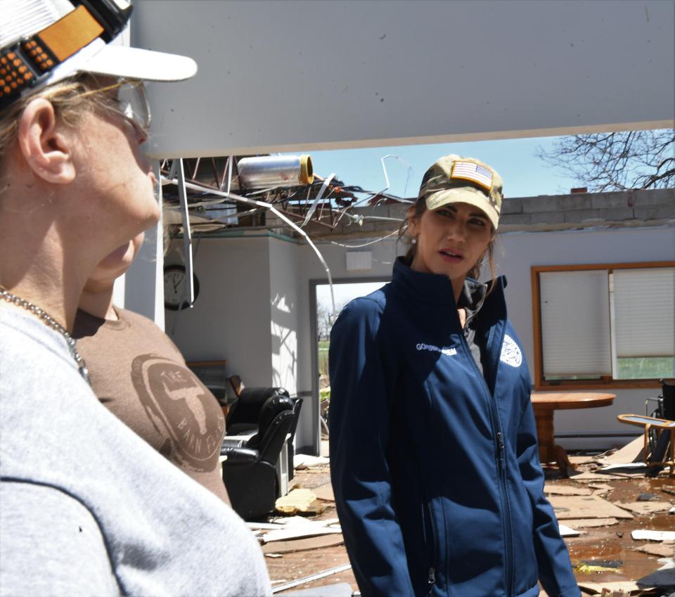 Governor Kristi Noem speaks with staff from the Avantara Nursing Home in Salem on Friday, May 13, 2022. The nursing home was heavily damaged in the storm Thursday.