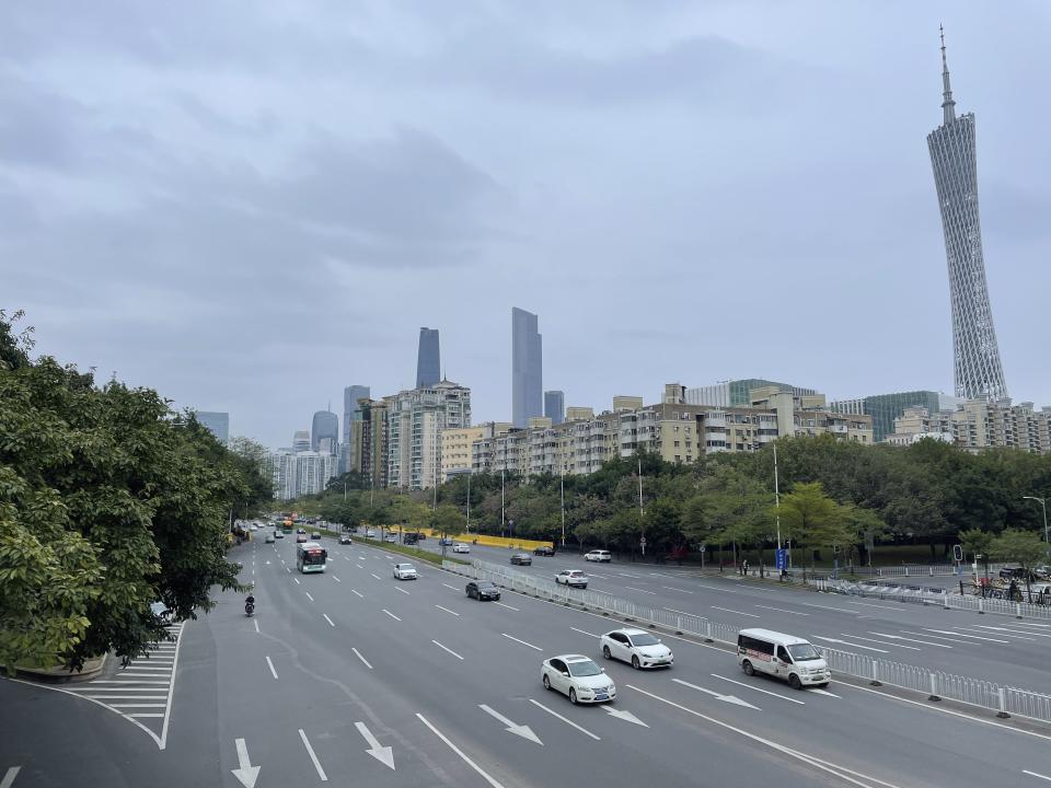 Traffic returns in the district of Haizhu as pandemic restrictions are eased in southern China's Guangzhou province, Thursday, Dec. 1, 2022. More Chinese cities eased some anti-virus restrictions as police patrolled their streets to head off protests Thursday while the ruling Communist Party prepared for the high-profile funeral of late leader Jiang Zemin. (AP Photo)