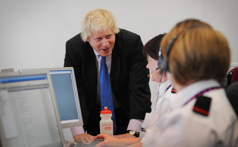 London Mayor Boris Johnson tours the new fire control centre in west London ahead of the London 2012 Olympic Games later this year after it was officially opened.