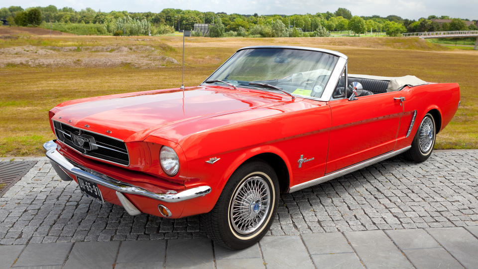 LELYSTAD, THE NETHERLANDS - JUNE 17: A 1965 Ford Mustang Convertible on display at the annual National Oldtimer day on June 17, 2012 in Lelystad, The Netherlands - Image.