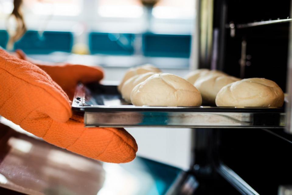 Swindon Advertiser: Every few weeks put oven gloves in the washing machine or a bowl of hot, soapy water to get rid of any grease that may have accumulated from handling oven trays. ( Getty Images)