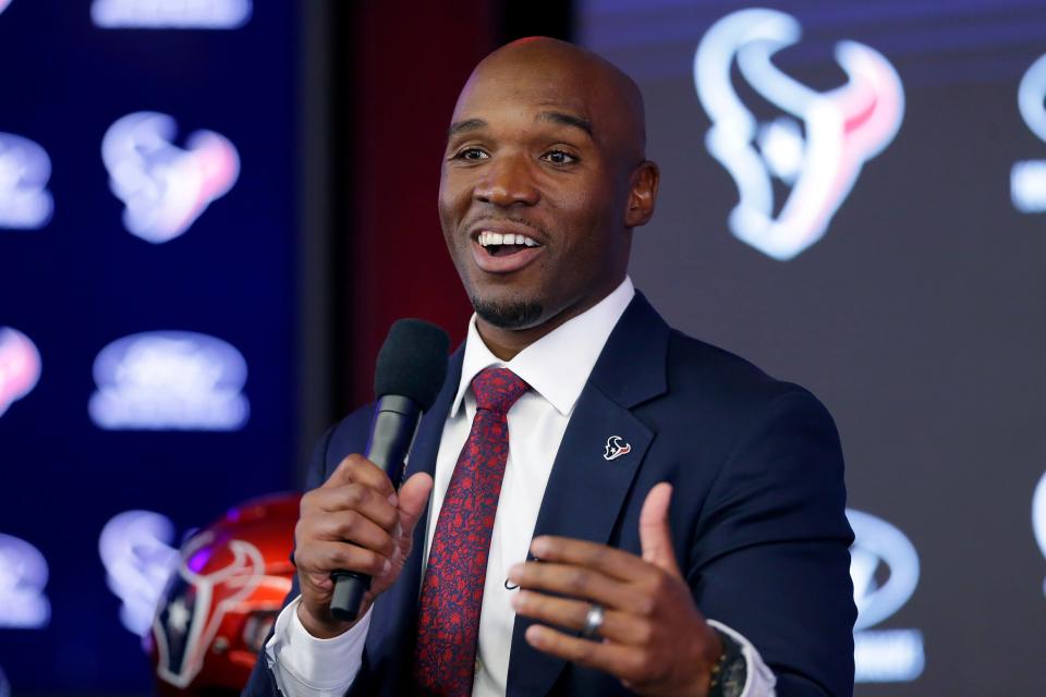 DeMeco Ryans answers questions at NRG Stadium in Houston during an NFL football news conference formally announcing him as the new head coach of the Houston Texans, Thursday, Feb. 2, 2023. (AP Photo/Michael Wyke)