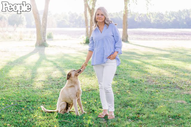 <p>Leslie Lynn Photography</p> Renee Beach with Mallory's rescue dog Miller