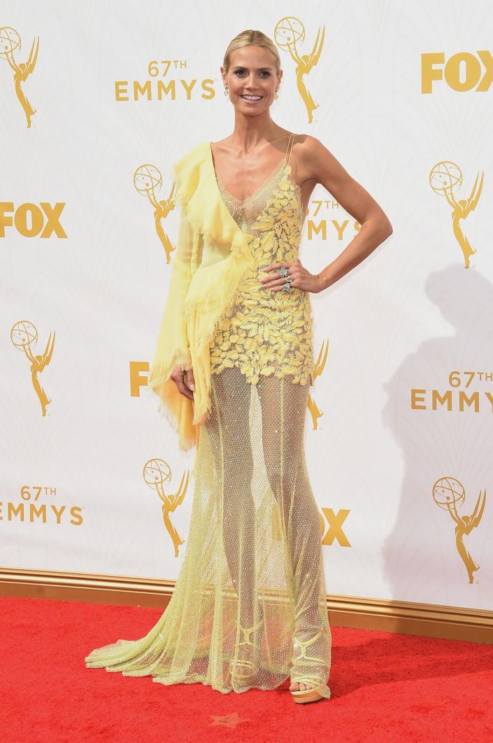 Heidi Klum in a yellow dress at the Emmys in 2015.