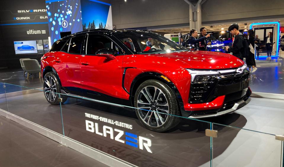 A red Chevrolet Blazer EV SUV sits at the New York auto show.