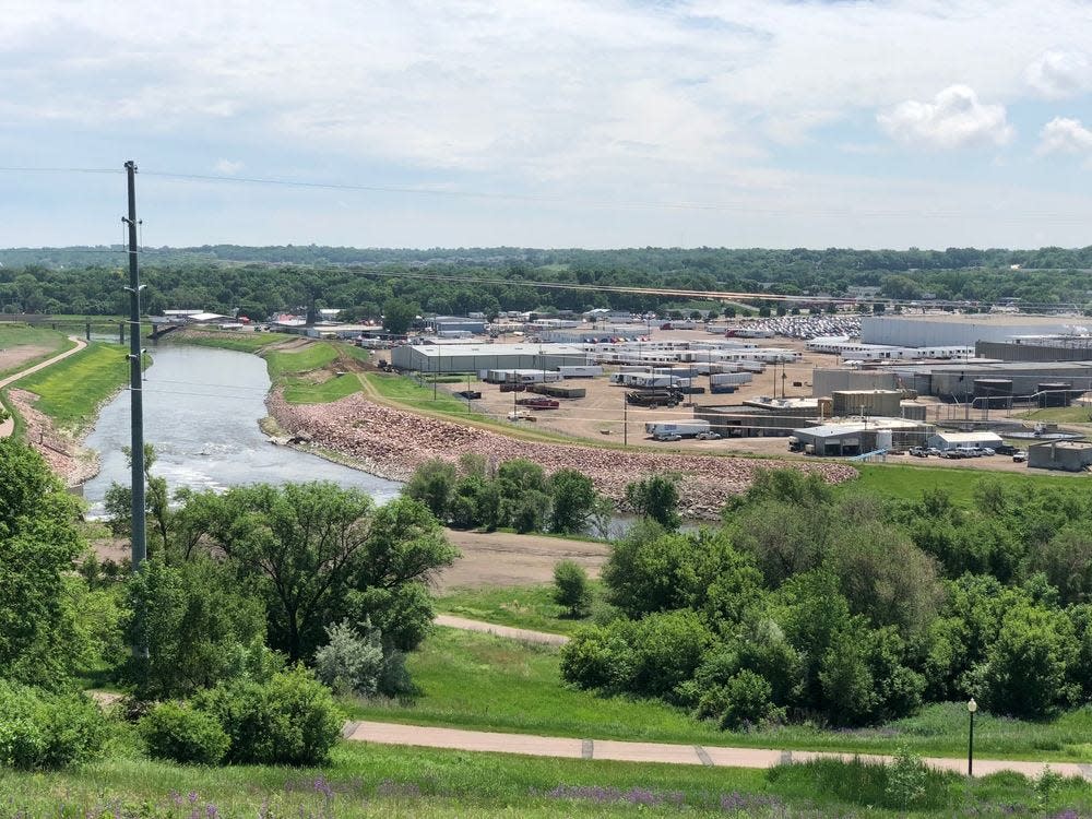 The Big Sioux River, shown here east of downtown Sioux Falls, is proposed to undergo a flood control study as part of the water-related funding plan under consideration by the South Dakota Legislature.