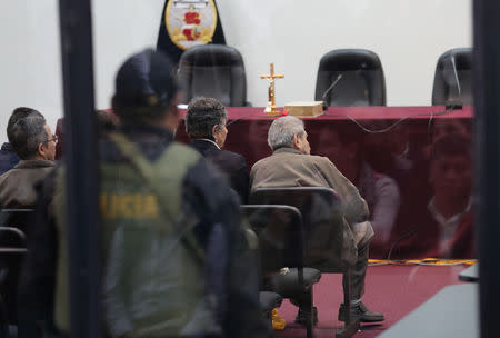 Shining Path founder Abimael Guzman and his wife and second leader Elena Iparraguirre attend a trial during sentence of a 1992 Shining Path car bomb case in Miraflores, at a high security naval prison in Callao, Peru September 11, 2018. REUTERS/Mariana Bazo