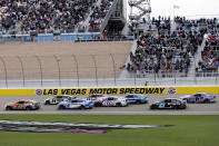 Drivers begin their final laps during a NASCAR Cup Series auto race on Sunday, March 5, 2023, in Las Vegas. (AP Photo/Ellen Schmidt)