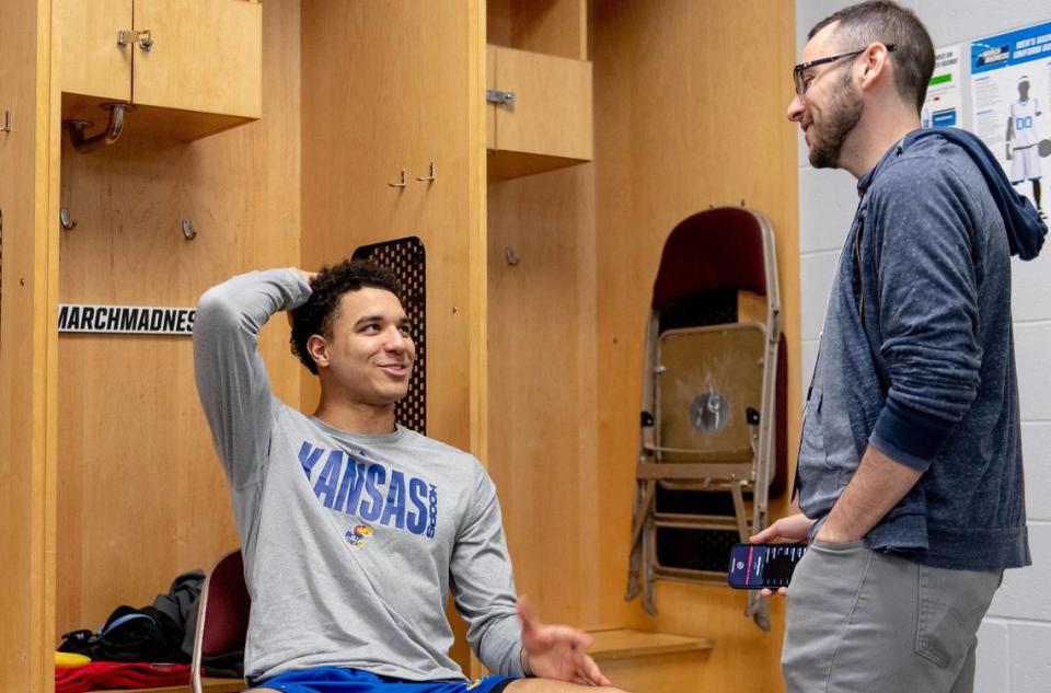 Kansas guard Kevin McCullar Jr. speaks with The Star’s assistant sports editor Scott Chasen in the locker room before a team shootaround in Des Moines.