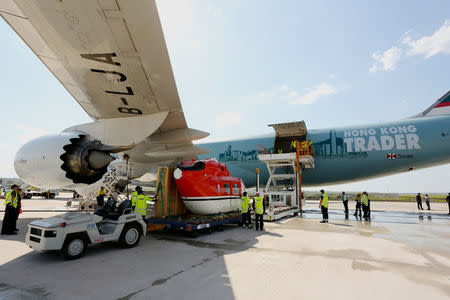 A Cathay Pacific Airways cargo plane is loaded with goods at Brisbane's West Wellcamp Airport November 23, 2015 in this handout provided by Cathay Pacific Airways October 19, 2016. Cathay Pacific Airways/Andrew Coates/Handout via REUTERS