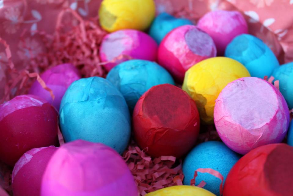 In this March 2012 image released by Cynthia Leonor Garza, a batch of cascarones are shown at the home of Cynthia Leonor Garza in Washington, D.C. Cascarones are hollowed-out eggs that are dyed, decorated and filled with confetti, then covered with a colorful piece of tissue paper. At Easter time, families make or buy cascarones, which is Spanish for "eggshells," for crushing over each other's heads. The tradition came to the United States from Mexico, where cascarones were used during fiestas and other celebrations. In the United States, it has become primarily an Easter tradition. (AP Photo/Cynthia Leonor Garza)