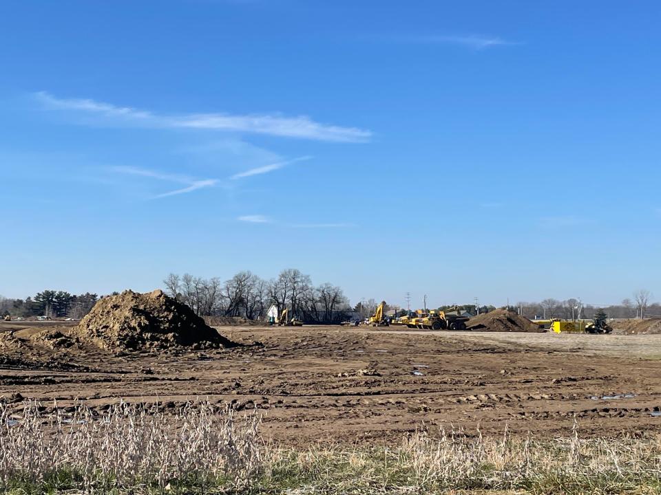 Earthmovers and other heavy equipment were idle on the site of proposed warehouses on Tuesday afternoon.