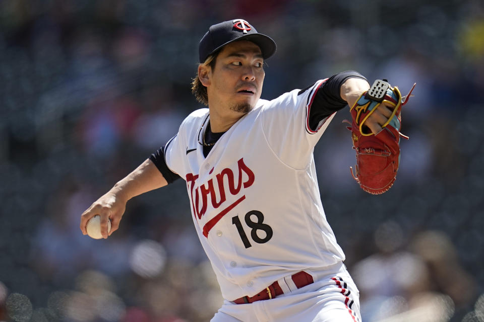 Minnesota Twins starting pitcher Kenta Maeda (18) delivers during the third inning of a baseball game against the Chicago White Sox, Monday, April 10, 2023, in Minneapolis. (AP Photo/Abbie Parr)