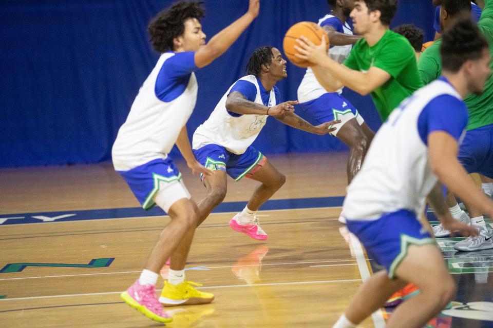 Members Florida Gulf Coast University menÕs basketball team practices on Tuesday, Sept. 24, 2024. It was the first practice for the upcoming season.