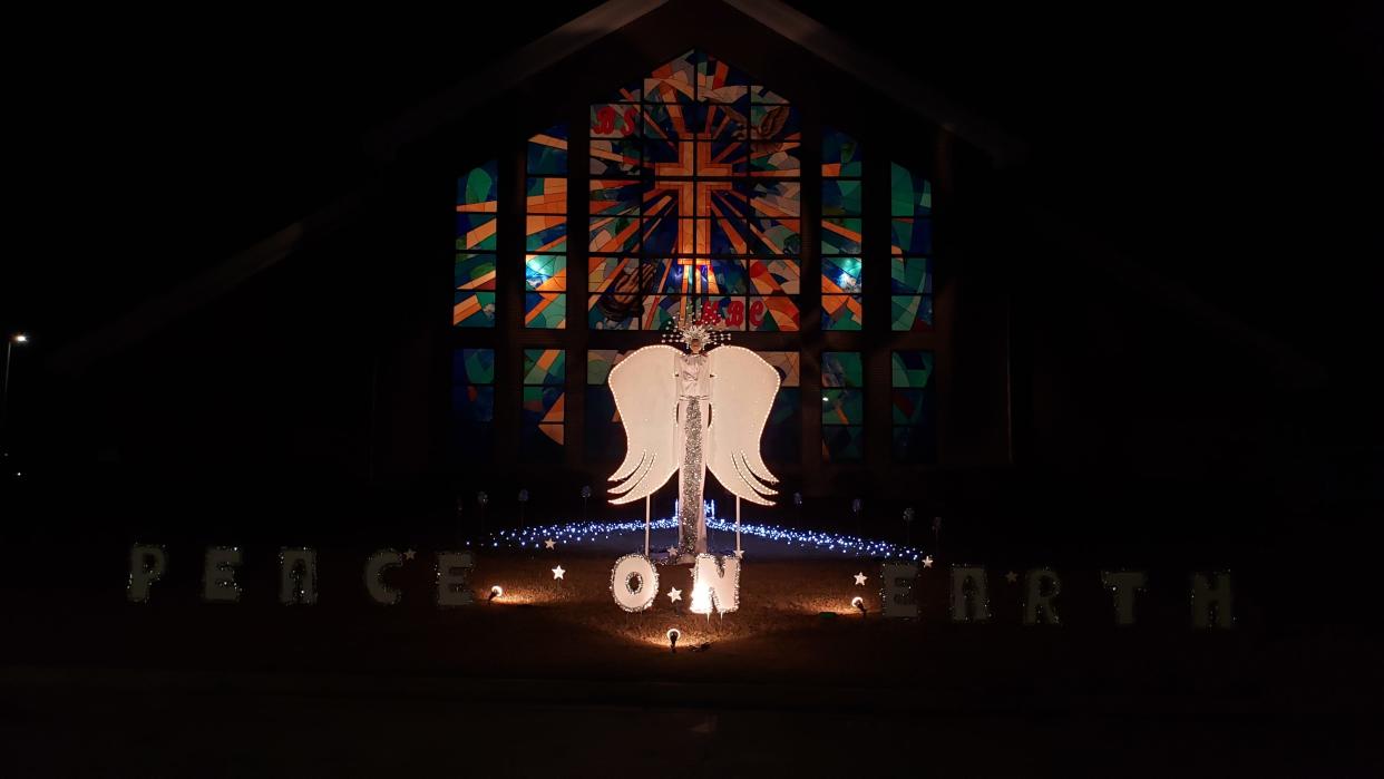 Members of Beauty Spot Missionary Baptist Church switched on lights for a 10-foot angel on Saturday, Dec. 2, 2023. The angel will be visible throughout the Christmas season at the church on old Raeford Road.