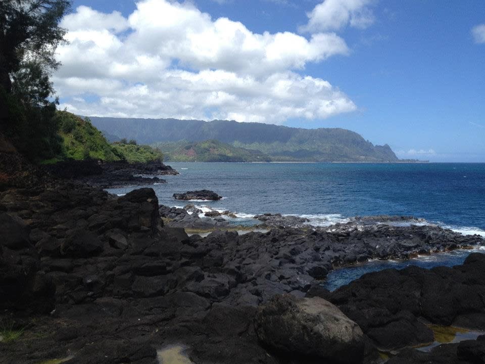 This Aug. 4, 2012 photo shows Queen's Bath on the island of Kauai is pictured in Princeville, Hawaii. Kauai Visitors Bureau Executive Director Sue Kanoho cautions that on any given day, the weather can changes and lead to deaths here by drowning. (AP Photo/Anita Hofschneider)