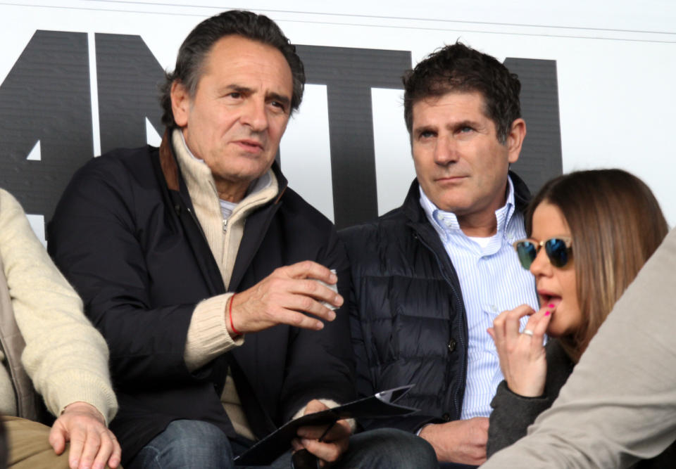 Italy's national team coach Cesare Prandelli, left, attends a Serie A soccer match between Atalanta and Sampdoria in Bergamo, Italy, Sunday, March 16, 2014. (AP Photo/Felice Calabro')