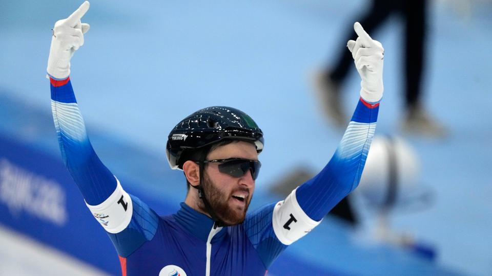 There's nothing like throwing up the double birds after a big win at the Olympics. (AP photo)