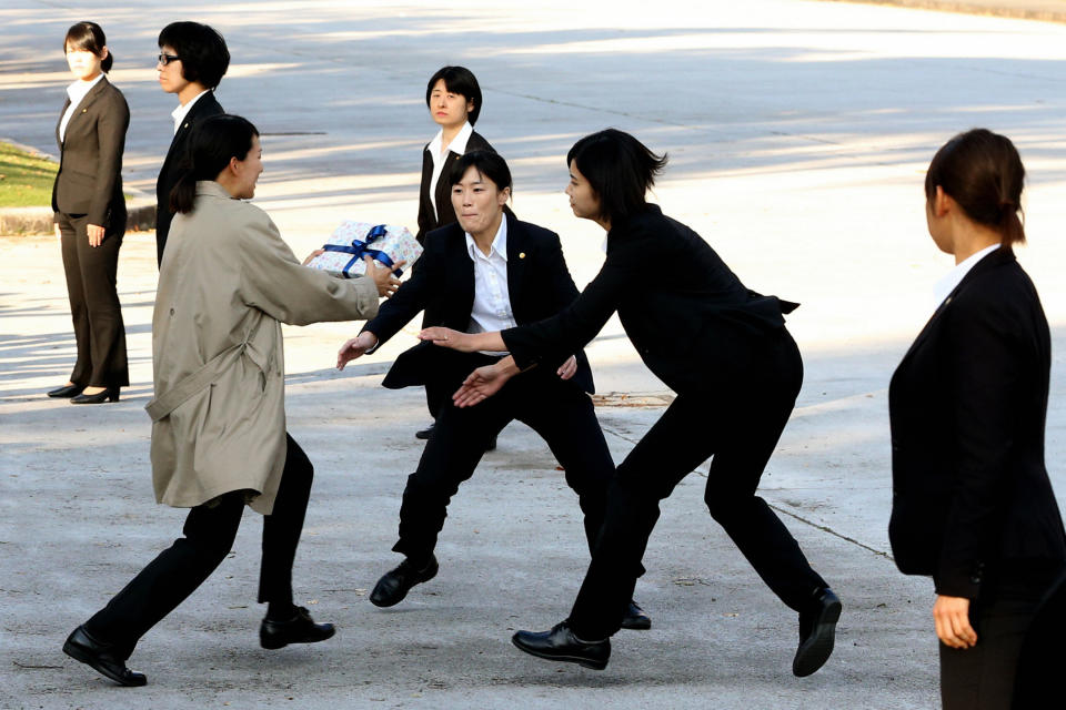 The female police squad practicing for the arrival of the Trumps. (Photo: Getty Images)