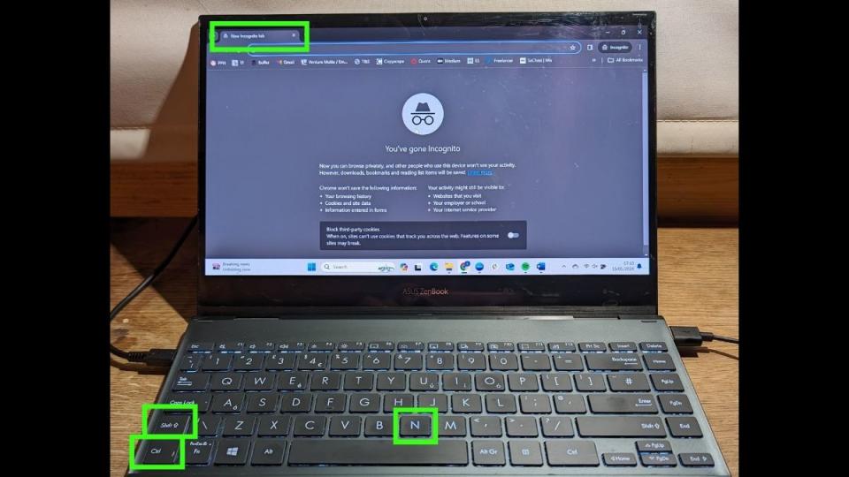  How to switch tabs in a web browser - Photo of a laptop with keys and browser tab highlighted