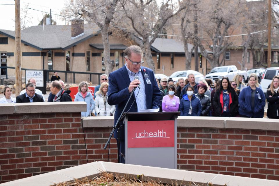 UCHealth Parkview President and CEO Darrin Smith speaks to the crowd at an event celebrating the hospital's recent merger with UCHealth.