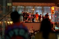 Toronto Raptors fans celebrate their win in the NBA championships in downtown Toronto, Ontario on early June 14, 2019. (Photo by Geoff Robins / AFP) (Photo credit should read GEOFF ROBINS/AFP/Getty Images)