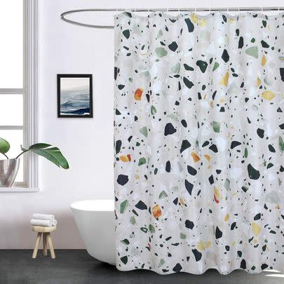 Add a quirky shower curtain