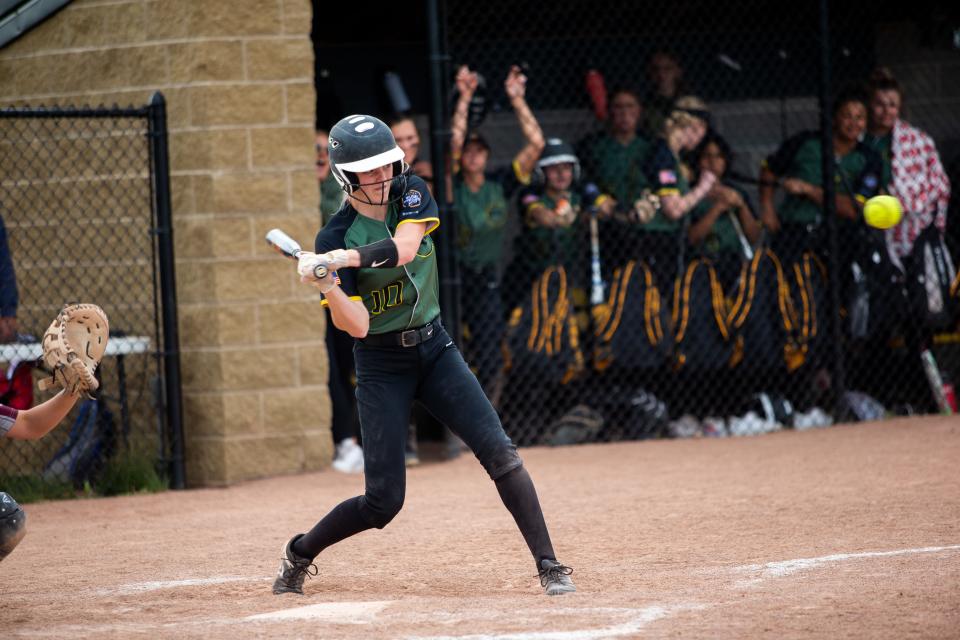 Hamilton's Madie Jamrog swings the bat during a game against Holland Christian Tuesday, May 17, 2022, at Hamilton High School.