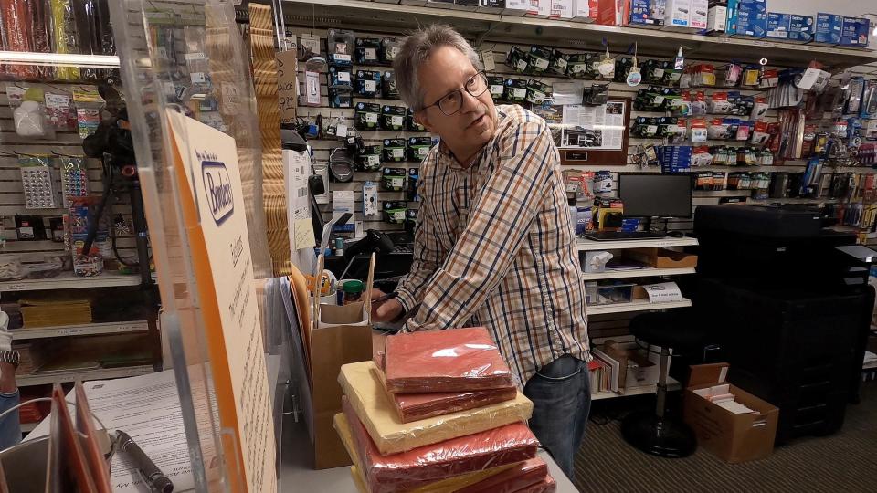 Borden's owner Barry Lubin works behind the counter at the Point Pleasant Beach store Monday, November 14, 2022. The Arnold Avenue shop, which has been a fixture in the town for more than a century, is closing.