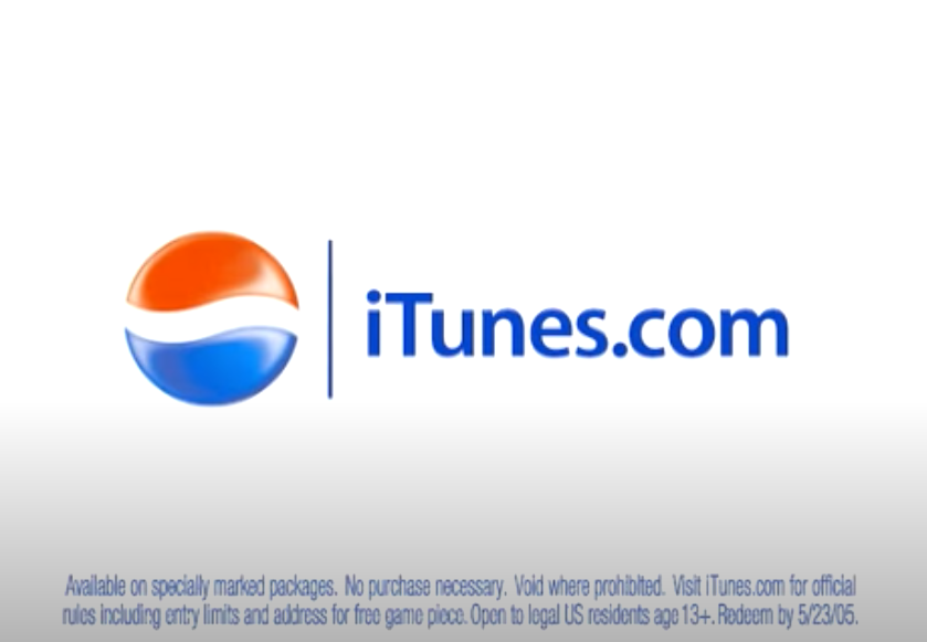 Screenshot from the commercial of the Pepsi logo next to the words "iTunes.com"