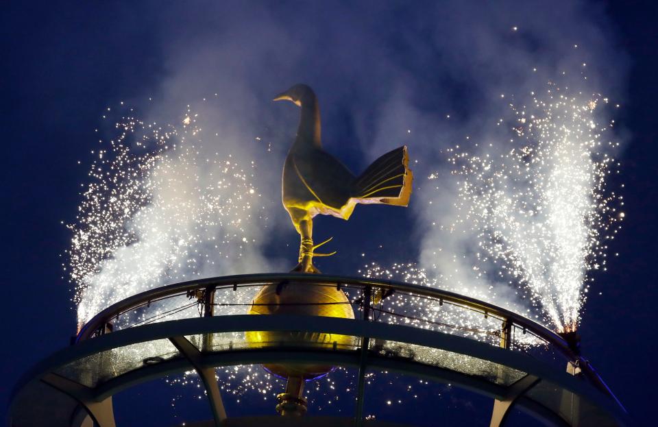 Fireworks light the Tottenham Hotspur's golden cockerel at the top of the stadium before the start of the English Premier League soccer match between Tottenham Hotspur and Crystal Palace, the first Premiership match at the new Tottenham Hotspur stadium in London, Wednesday, April 3, 2019.
