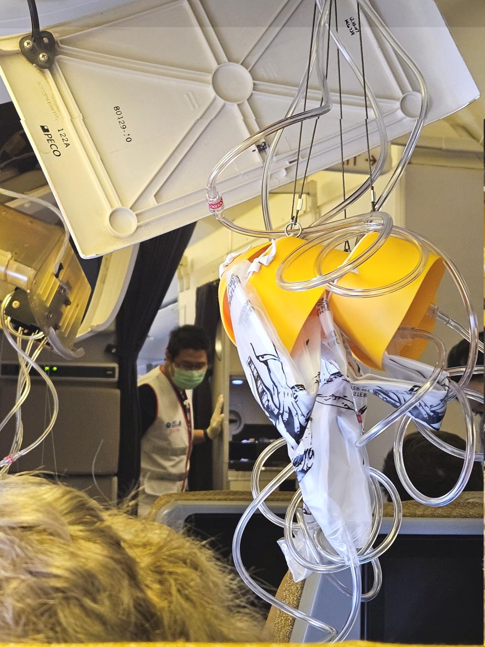 The interior of Singapore Airline flight SQ321 is pictured after an emergency landing at Bangkok's Suvarnabhumi International Airport in Bangkok, Thailand, on Tuesday (via REUTERS)