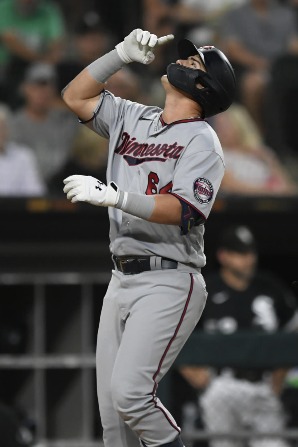 Minnesota Twins' Jose Miranda celebrates at home plate after hitting a two-run home run during the fourth inning of the team's baseball game against the Chicago White Sox on Tuesday, July 5, 2022, in Chicago. (AP Photo/Paul Beaty)