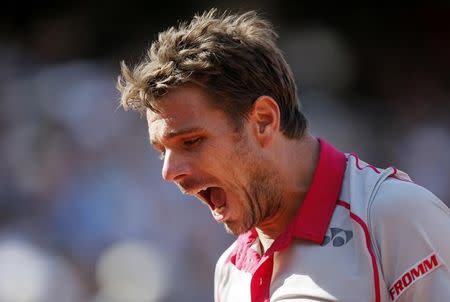 Stan Wawrinka of Switzerland reacts during his men's final match against Novak Djokovic of Serbia at the French Open tennis tournament at the Roland Garros stadium in Paris, France, June 7, 2015. REUTERS/Gonzalo Fuentes
