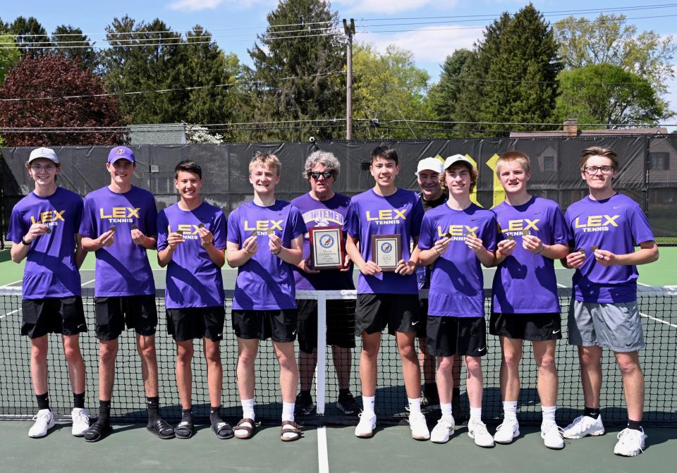 Lexington celebrates its sixth straight title in the Ohio Cardinal Conference Tennis Tournament.