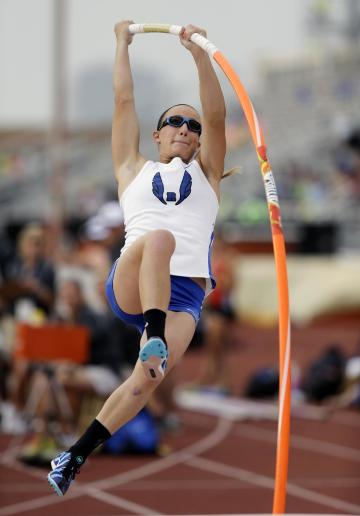 Emory Rains High School&#39;s Charlotte Brown competes in the Girls 3A pole vault at the UIL State Track & Field meet, Friday, May 9, 2014, in Austin, Texas. Brown, a pole vaulter who happens to be legally blind, starts on the clap from her coach and counts her steps on her approach. (AP Photo/Eric Gay)